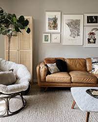 Living Room Decor Ideas Brown Couch With Rattan Accent And Gallery Wall Brown Couch Living Room Brown Living Room Decor Papasan Chair Living Room