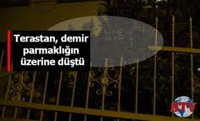 terastan demir parmakligin uzerine dustu teras demir