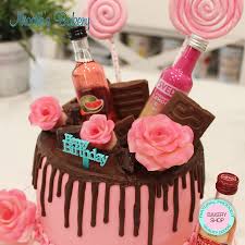 Let's move your mouse scroll to go down to get images of 21 birthday. Drip Cake With Mini Alcohol Bottles And Chocolate Roses