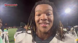 Cleveland Heights John Gordon Jr, Ammaar Lakes, Brandon Caesar & coach Mac  Stephens