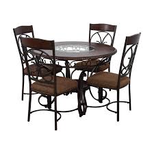 With circular glass tops to rectangular wood finishes, you will find a dining room table to fit your style. 75 Off Ashley Furniture Ashley Glambrey Glass And Wood Dining Set Tables