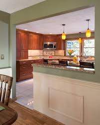 Kitchen In Nashua Nh Placing The Same Granite On The Island And As A Cap On The Half Wall Custom Kitchen Remodel Kitchen Remodel Small Kitchen Remodel Layout