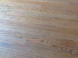 Bare oak wood is porous and absorbs paint quickly so you must treat the surface with a base coat of primer or the new finish will ultimately fail. Painting Oak Floors