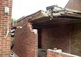 How much does building a garage cost? Dramatic Moment Garage Falls Onto Builder After He Knocks Down Supporting Wall Without Removing Roof First Daily Mail Online