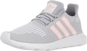 The pink ozweego shoes feature durable uppers. Amazon Com Adidas Originals Women S Swift W Running Shoes Grey Two Ice Pink White 9 Medium Us Road Adidas Originals Women Adidas Women Running Shoes Grey