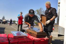 Guy ramsay fieri is an american restaurateur, author, and an emmy award winning television presenter. Guy Fieri Fires Up The Grill For Santa Rosa Fire Evacuees And First Responders