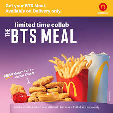 The bts meal consists of nine chicken nuggets, two sauces, medium fries and a drink, and comes in a box with a purple logo. The Bts Meal Available On Delivery Only Mcdonald S