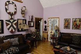 Asarè | african art & decor on instagram: African Themed Living Room Decor With Wooden Wall Art Decolover Net