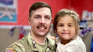 James "Speedy" Williams plays catch with kids at Family Fun Night in  Southington