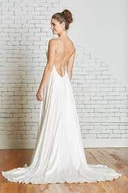 The Corey Gown Has A Stunning Open Back With Criss Crossing Tie Straps And A Cami Style Deep V Strappy Wedding Dress Wedding Dress Low Back Aline Wedding Dress