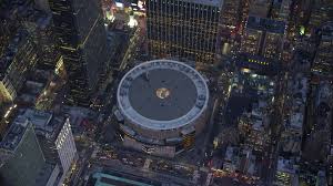 Madison square garden , often abbreviated as msg, and simply called the garden, is the name of four arenas in new york city, united states as as the arena has moved to new locations the same name remains till this day, although since 1925 madison square garden has been neither a garden. 5k Stock Footage Aerial Video Bird S Eye View Of Madison Square Garden Arena Midtown Manhattan New York City Winter Twilight Aerial Stock Footage Ax65 0244 Axiom Images