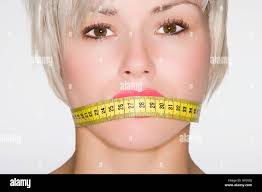 Mouth over tape woman hi-res stock photography and images
