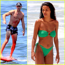 The kooples unveils its new brand ambassadors for the ss21 campaign. Vincent Cassel Goes Surfing During Beach Day With Wife Tina Kunakey Bikini Shirtless Tina Kunakey Vincent Cassel Just Jared