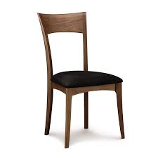 The slatted, ringed back demands attention for its modern vibe. Ingrid Dining Chairs Walnut Wood American Made Mid Century Modern