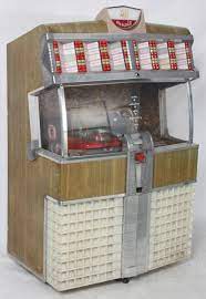 Ami model h jukebox from 1957 jukebox arcade bar radios radio antigua vintage music vintage box music machine rock and roll juke box ami i 200 ami i 200 1958 near a général electric fridge from 40's; Ami Model E 120 Jukebox 1953