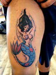 Big Boobs and Fins! — Lighthouse Tattoo