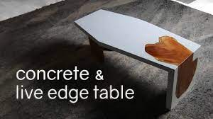 Wood and concrete starburst coffee table surrounded by a linen sofa, a stripe cream accent chair, and a rectangular concrete waterfall indoor outdoor coffee table. Diy Concrete Live Edge Waterfall Table How To Make W Gfrc Mix Slab Table Live Edge White Concrete Live Edge