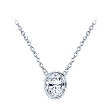 This graceful diamond pendant features over forty round brilliant cut diamonds in a striking oval design. Pin On Special