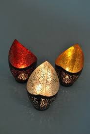 Metal black candle tealight holder luxurious metal candle holder wholesale rates most running metal candle holder. Tea Light Holder Oval Black Metal Tealight Candle Holder Silver Or Copper Colour Leaf Four Seasons Liverpool