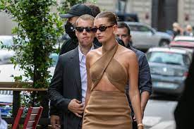 Hailey Bieber Wears Ab-Baring Nude Cutout Dress for Macron Meeting