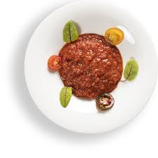 Lavate e tritate tutte le verdure molto finemente e mettetele sul fuoco con 3 cucchiai d'olio, l'aceto e del sale. Salsa Rossa Gastronomia Falcone