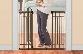 The 38 extra tall gate fits openings 29.5 to 53 wide and has a wide door, making it easier to walk through. Summer Infant Multi Use Extra Tall Walk Thru Gate