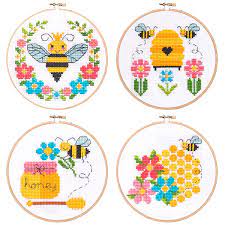Model stitched one over two on 40 ct. Bees And Honey Cross Stitch Pattern Cross Stitch Patterns Cross Stitch Patterns Christmas Cross Stitch Kits