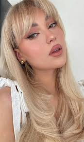 She's been experimenting with all kinds of hair looks over the past several months, and she was actually rocking a slightly darker blonde look just last month. Cute Haircuts Hairstyles With Bangs Layered Blonde Long Hair With Bangs