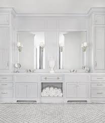 This bathroom by jennifer worts also features a beveled mirror for extra reflection and an acrylic stool for a touch of modern style. Pin On All Home Inspiration