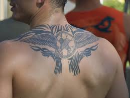 Tribal Wings And Crossed Fingers Swim Fins Back Tattoos For Guys Wing Tattoo Men Tribal Back Tattoos