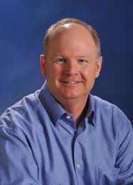 Robert B. “Bob” Dorigo Jones, Epsilon Nu '85, receives the Distinguished  Alumni Service Award.