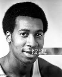 Pete Cross of the Seattle Supersonics rebounds against the Boston... News  Photo