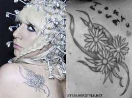 Daisy tattoos are versatile in that you can get them done in various colors and sizes. Lady Gaga S Tattoos Meanings Steal Her Style