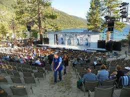 volunteer helping someone find a seat picture of lake