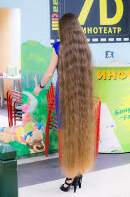Long Hair Girl Shows Off Her Floor Length Hair Girls With Very Long Hair Long Hair Styles Very Long Hair Long Hair Girl