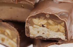 Layer the cut pieces of nougat between pieces of parchment paper and place in an air tight container, and put them into the freezer. What Candy Bars Have Nougat Answered Brand Informers
