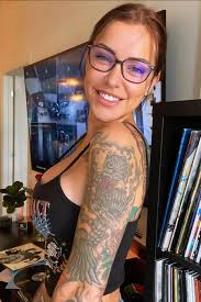 Beautiful Tattooed Woman with Exquisite Style