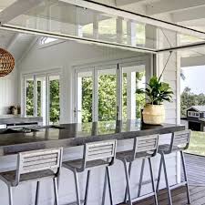 If you don't have quite the budget to create a full on backyard kitchen, then try bringing your indoor kitchen into the backyard space by creating a. Home Holiday Inspiration The Grove Byron Bay Outdoor Kitchen Design Home Indoor Outdoor Kitchen