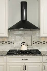 Slate appliances, or grey, create another versatile option when it comes to matching kitchen cabinet colors. Black Range Hood Houzz