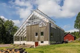 Attached greenhouses are exactly what you would expect: Gorgeous Solar Powered Greenhouse Home In Sweden Hits The Market