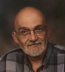 Obituary of John Edward Ramsey