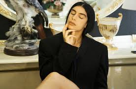 These archetypes are all solo and set against a bright white background, with watermarks and are meant to represent the limited roles accessible to women. Sevdaliza Estrena