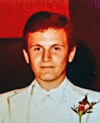 A wedding Pic of me. If one of the talented folks could make more crisp and  clear I want to give it to my wife. Thx yawl