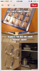 Pots And Pan Lid Storage With Dollar Tree Sticky Hooks Super Easy Please Like After Viewing Life Hacks Organization Organization Hacks Household Hacks