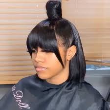 The key to a messy ponytail is to embrace the imperfections. Frontal Quickweave X Bangs Bun Tag Someone Who Would Wear This And Follo Quick Weave Hairstyles Weave Ponytail Hairstyles Hair Styles