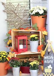 The bright topiaries that flank the door and the beautiful urns are great spring front porch ideas because they will last season after season with a few color updates. Fall Front Porch With Personalized Door Plaque The Kim Six Fix