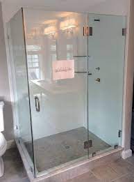 A Frameless Swinging Shower Door Hinged From The Stationary Panel Which Closes Against A Large Return P Glass Shower Doors Glass Shower Door Hinge Shower Doors