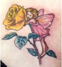 Above is a superbly done fairies tattoo on shoulder blade of a hottie. 10 Fascinating Fairy Tattoo Designs