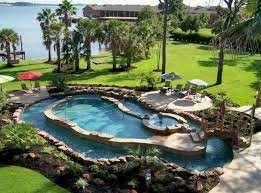 On a separate piece of paper, draw a lazy river with equal spacing, natural curves, and a uniform look. Inground Swimming Pools Kits Swimming Backyard Pool Backyard Pool Designs Ideas Backyard Pool Designs