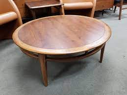 Not only do they anchor your space, but they offer room to stage a display and serve up trays of treats when you find yourself entertaining. Mid Century Modern Round Walnut Coffee Table By Lane From Peg Leg Vintage Of Beltsville Md Attic
